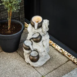 Solar Fels-Kaskadenbrunnen hell mit LED-Beleuchtung