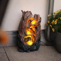 Solar Zierbrunnen im dekorativen Wurzeldesign und LED Licht